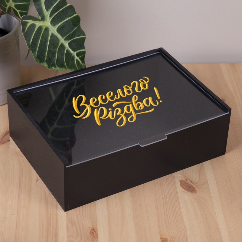 Подарункова коробка прямокутна чорна з прозорою кришкою 23×16×6.5 см «Веселого Різдва!»